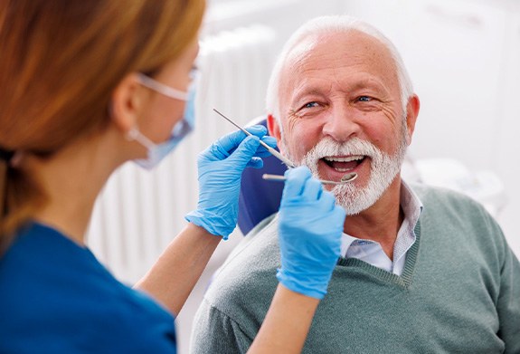 Man smiling during dental exam