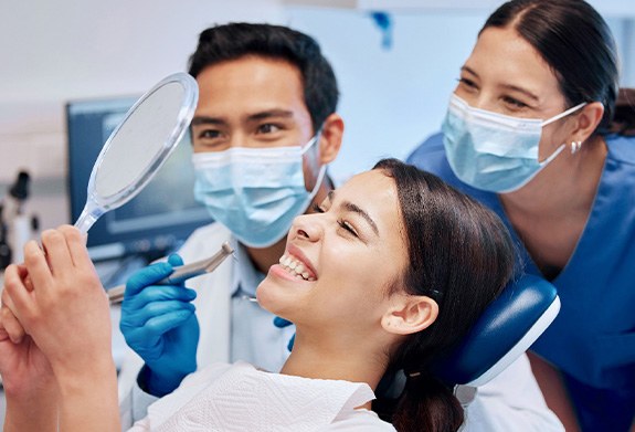 Patient in Montpelier smiling with dental implants