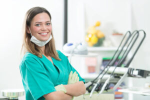 Smiling dental hygienist in dentist’s office